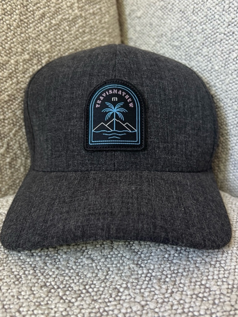 Travis Mathew Charcoal Flexfit Hat with Teal Patch Logo